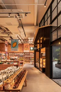 Modern retail storefront with concrete and glass materials