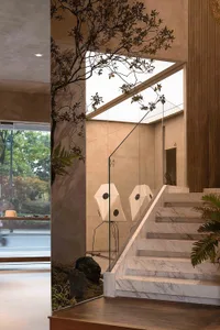 Modern retail space with marble stairs and storefront window