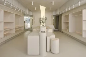 A minimalist retail space featuring marble interior elements.