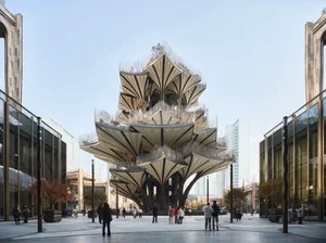 A modern public space featuring a unique metallic structure with multiple levels and an open courtyard.