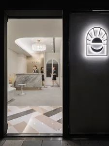 A modern reception desk with a marble finish.