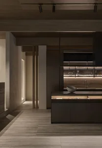 Contemporary residential kitchen featuring wood, marble, and metal materials.
