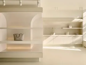 Modern retail store with stone display and minimalist design elements.
