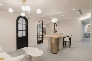 Modern spa interior with marble columns and concrete flooring