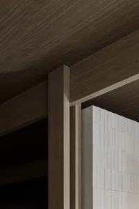 An image showcasing minimalist interior design featuring wooden architectural elements.