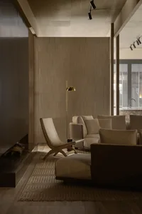 Modern styled living room featuring sleek leather furniture.