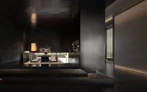 A modern living room with a concrete floor, glass walls, and minimalist decor.