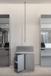 Modern minimalist bathroom with concrete sink and floor.