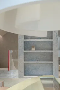 A modern retail storefront featuring granite.