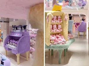 Various plush toys displayed in colorful fabric structures within a toy shop.