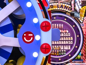 A colorful, plastic indoor retail playground with lights and decorative elements.