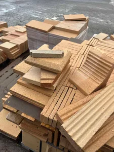 A stack of various ceramic construction materials.