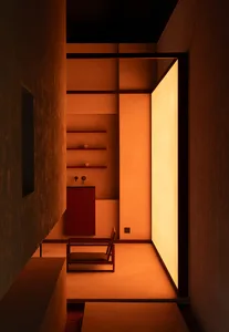Modern minimalist interior featuring metal furniture and shelves.
