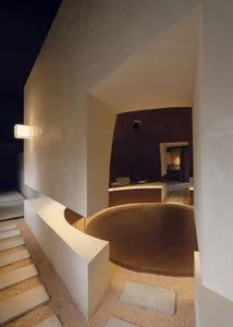 Modern circular living space featuring a concrete platform