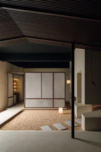 Modern living room with concrete flooring and minimalist design