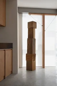 Modern interior space featuring a wooden column
