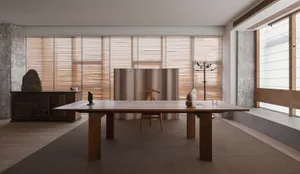 A modern home office with a wooden table, concrete walls, and natural wood finishes.