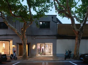 Modern retail storefront with glass and concrete storefront display