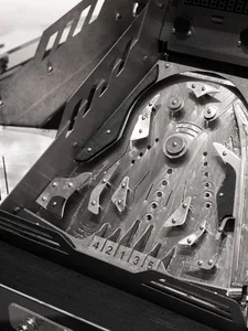 An industrial-style game room with metallic elements.