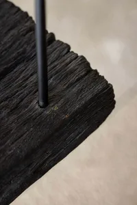 Close-up of industrial furniture made from metal and wood materials.