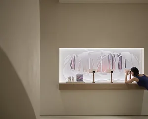 A surreal paper-cut display in a Scandinavian-themed retail store.