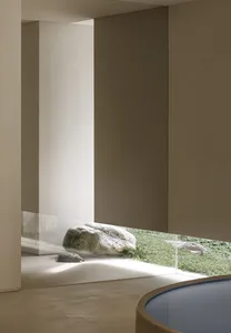 A minimalist interior design featuring concrete elements