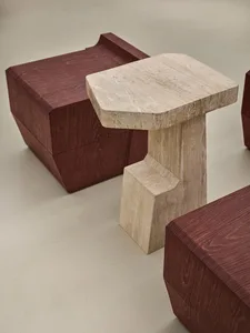 A modern, contemporary furniture design featuring marble elements.