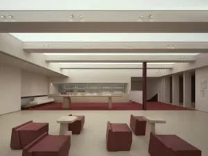 A minimalist retail store with wooden benches and concrete flooring.