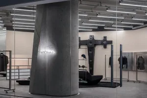 Industrial retail space with concrete pillars and modern design features.