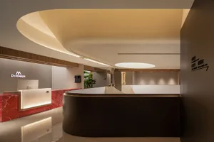 現代款待接待區室內設計，採用複合大理石與混凝土材質。