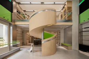 A modern retail space featuring wooden structures and metallic accents.