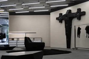Modern retail store with black metal accents and concrete floor