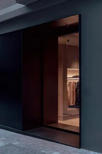 Modern retail storefront with glass and concrete materials