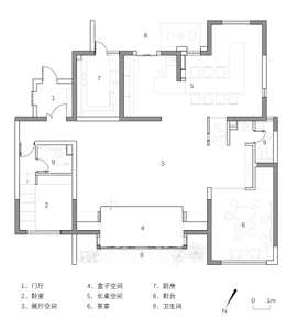 Modern residential space layout with integrated kitchen, living, and dining areas.