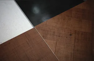 Different patterns of wooden floor tiles displayed on a floor.