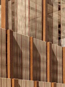 An architectural design featuring a panel system composed of wood and glass materials.