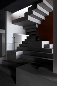 Modern concrete staircase with minimalist design.