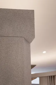 Close-up of a modern interior wall made of granite stone