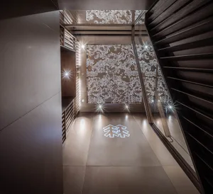 A modern commercial interior with metal details and intricate designs.