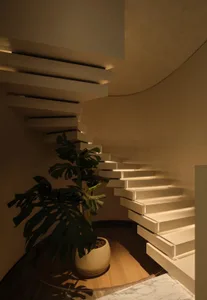 Mid-century modern staircase in an indoor setting.