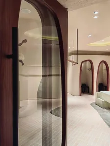A minimalist retail storefront with wooden elements and an open, inviting design.