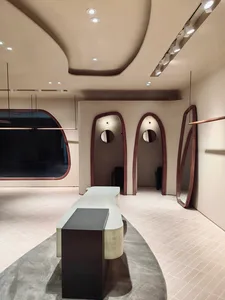 A modern retail shop featuring a combination of wood and concrete materials.