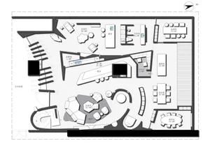 A modern office space with various functional zones such as a meeting room, lounge area, and conference room.