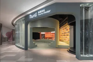 Modern library interior featuring glass walls and concrete flooring