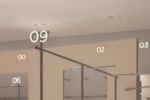 Clothing racks with lighting in a retail shop