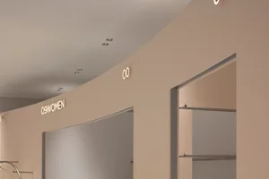Interior design of a clothing store with minimalist lighting fixtures.
