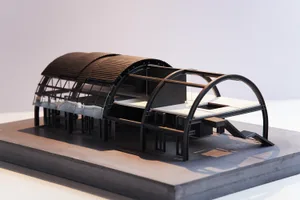 Industrial-style building model made of metal and glass