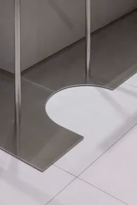 A modern, minimalist industrial-style toilet floor.