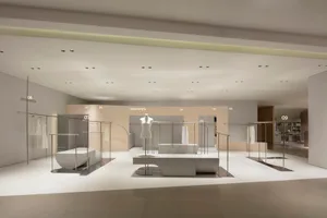 現代零售空間，搭配白色混凝土、金屬與木質元素。