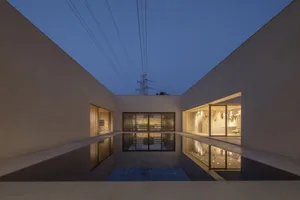 A modern concrete living space with a minimalist design.
